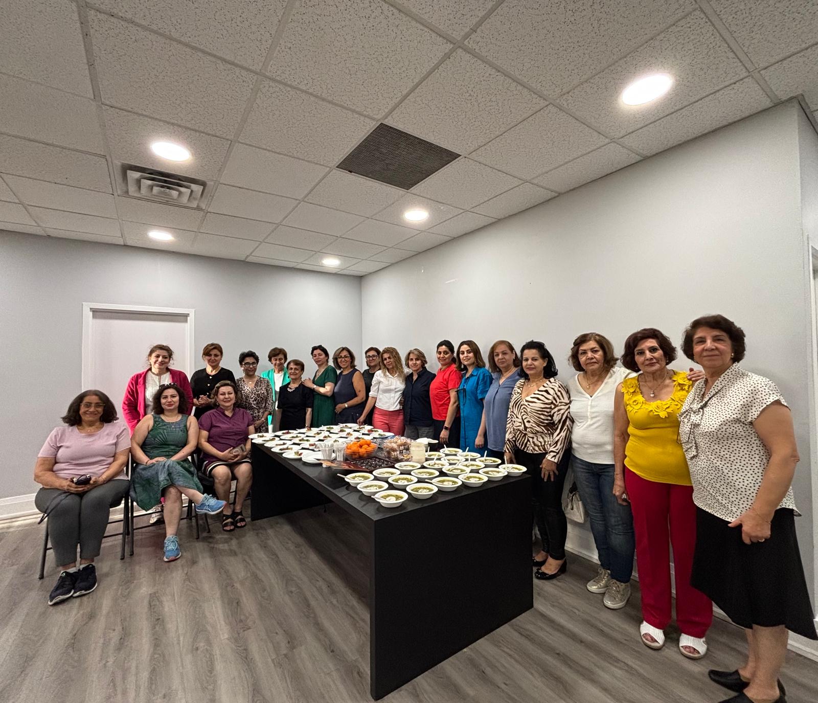 Community members gathering around a shared meal