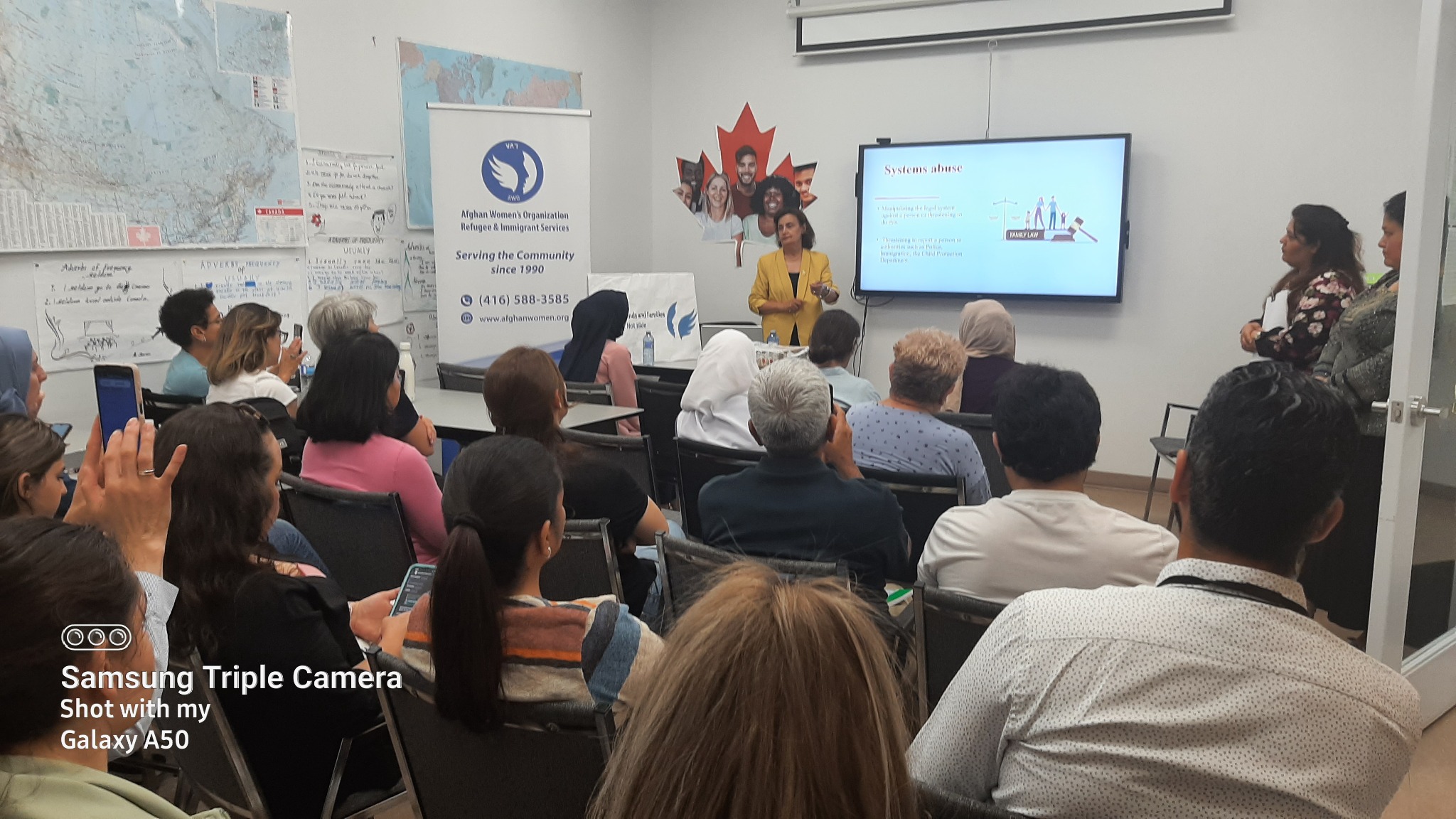 Community members attending a family law and safety workshop