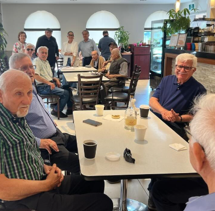 Older adults connecting during a community gathering
